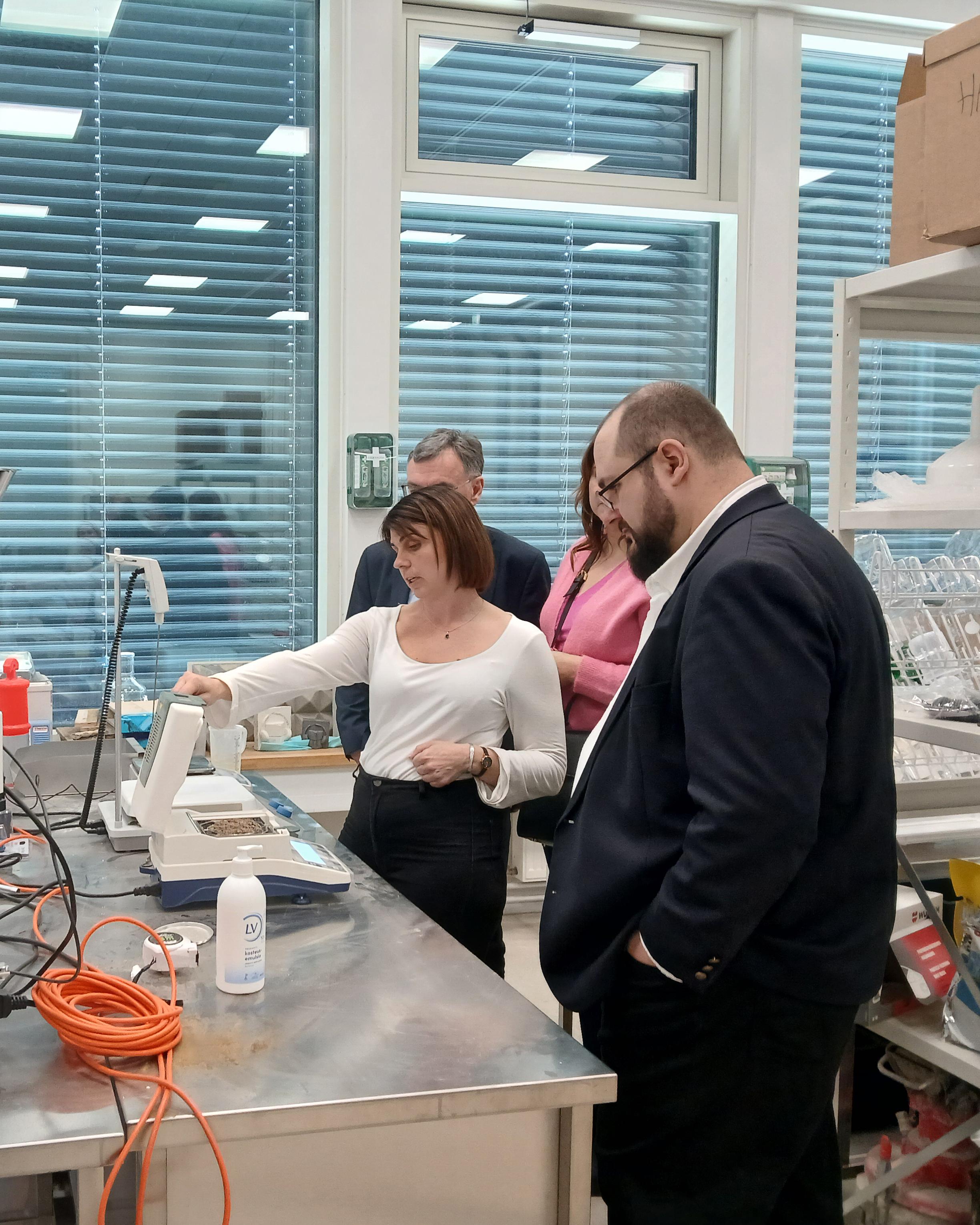 Project Manager Elli Tykkä showing KymiLabs's equipments.